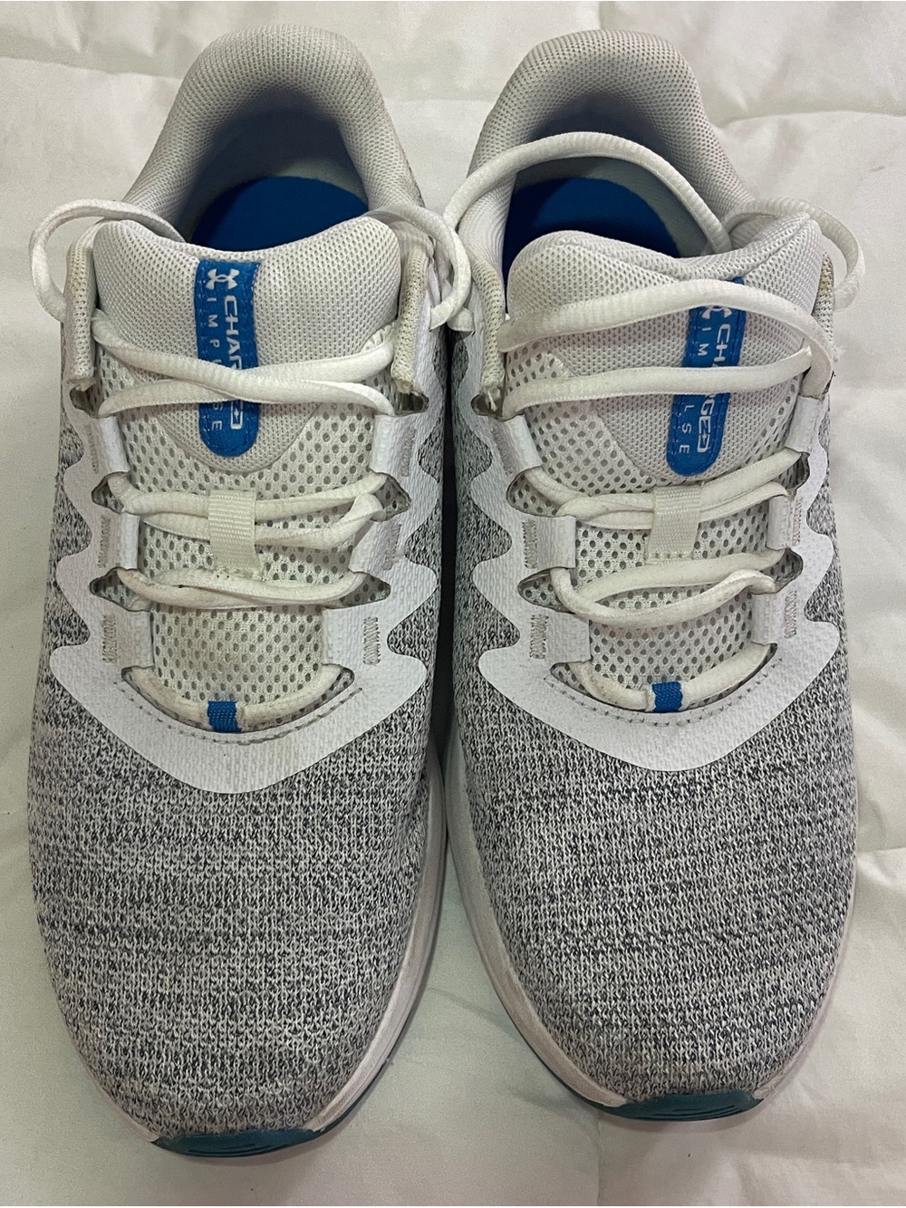 Under Armour Charged Impulse 3 Knit running shoes.